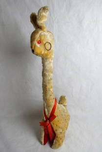 Vintage Stuffed Plush Alpaca/ Lama Toy w. Earrings: 1950's Stuffed Plush Alpaca/ Lama Toy with Long Neck and Earrings. Measures 21" tall. Condition: Good