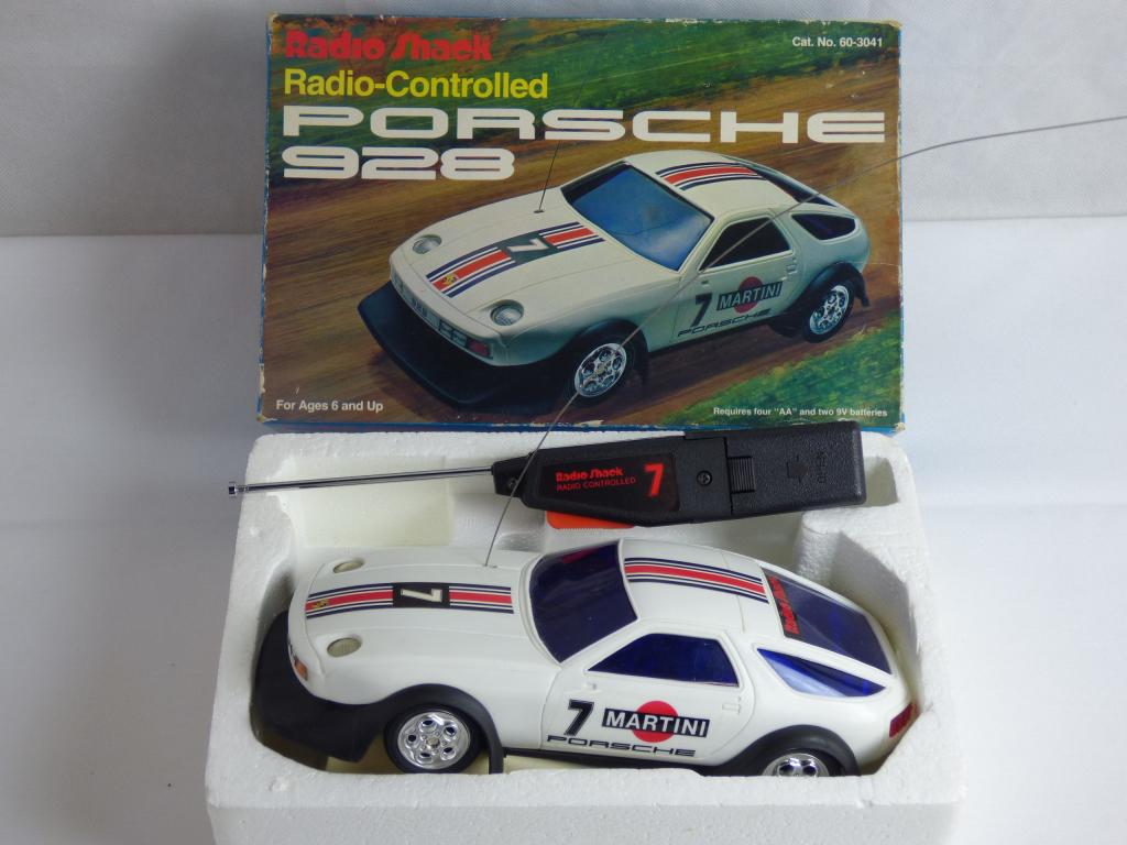 Radio Shack Radio Controlled Porsche 928: Vintage Radio Controlled Porsche 928 by Radio Shack in original box. Condition: Good, appears to be in unused condition. Box shows minor shelf wear
