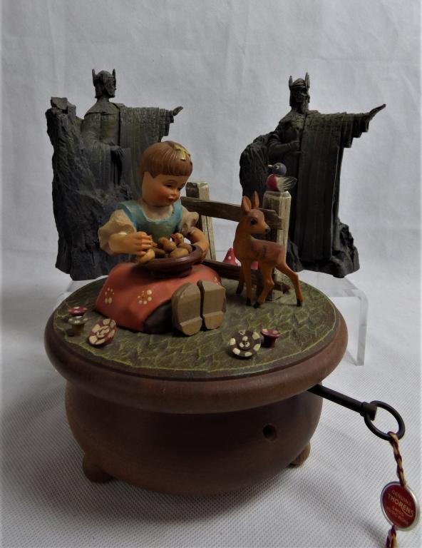 Anri Wood Carved Music Box & Lord of the Rings Scr: Anri Wood Carved Music Box and Pair of Lord of the Rings "THe Argonath" Sculptures by Mary Maclachlan. Condition: Anri Music box is missing knob on side, unknown if working. One of the Lord of the Rin