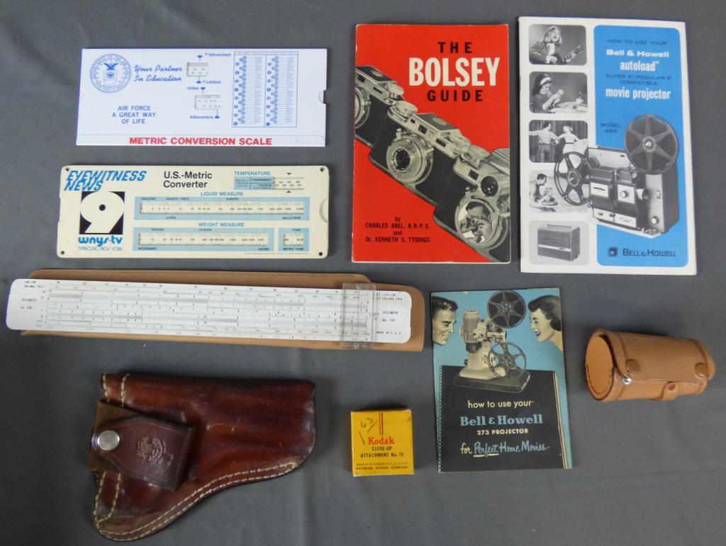 Vintage Photo Collectibles, Rules, Gun Holster: Lot of Vintage Photography Collectibles- Bolsey Filter Kit, Bolsey Guide, Kodak Close-Up Attachment No. 13, two Bell & Howell Movie Projector Booklets. Vintage Acu-Math 150 Slide Rule, Two Metric Conv