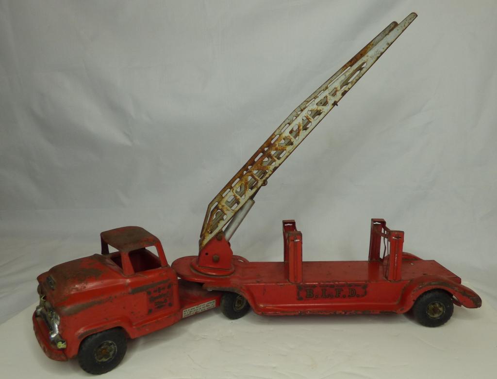 Buddy L BLFD Pressed Steel Fire Truck: Vintage Buddy L B.L.F.D. Old School Areal Ladder Fire Truck. Condition: Used, shows wear