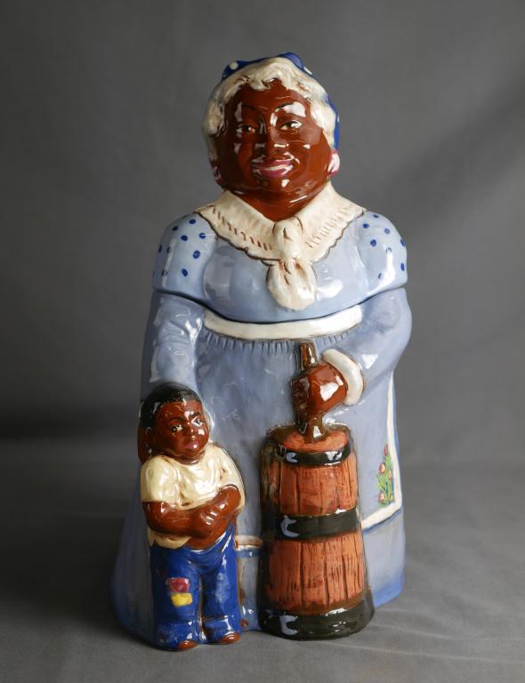 Rick Wisecarver Black Mammy Cookie Jar Signed: Rick Wisecarver (1950-2002, American) Wihoa's Original Black Mammy Cookie Classie Jar. Signed at Bottom. Measures 13" tall. Condition: Good