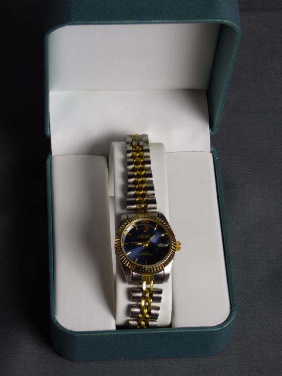 Ladies Rolex Oyster Perpetual Wrist Watch Replica: Ladies Rolex Oyster Perpetual Wrist Watch Replica in Stainless Steel Case. Condition: Good working condition