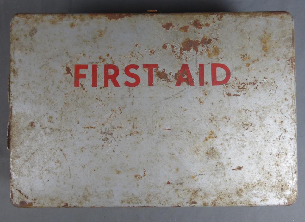 Vintage Metal First Aid Kit with Contents: 1974 Vintage Reader's Digest First Aid Kit with Contents. Condition: Good overall condition with minor rust on box