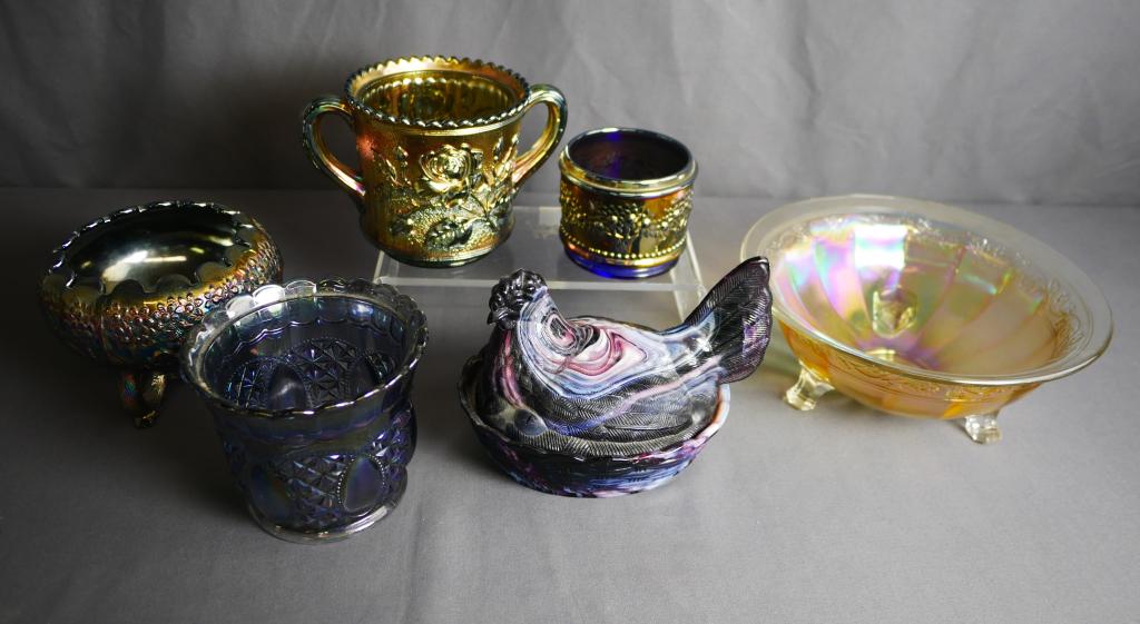 Carnival Iridescent Glass Assortment: Group of Carnival Glass including Fenton. Measure- 5"-3 1/2" tall. Condition: As Found. Jars missing lids, Hen has damage on side; Footed bowl have chips on bottoms