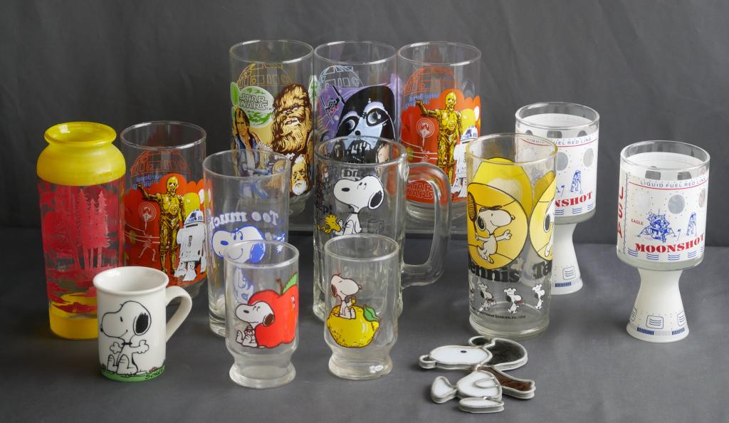 Star Wars & Snoopy Peanuts Collectible Glasses: Four Vintage Burger King Star Wars Glasses; 2 Apollo 11 Glasses; viriety of Snoopy Peanuts Glasses with small slag glass hanging; 1960's Ducks Beverage Glass. Condition: Good
