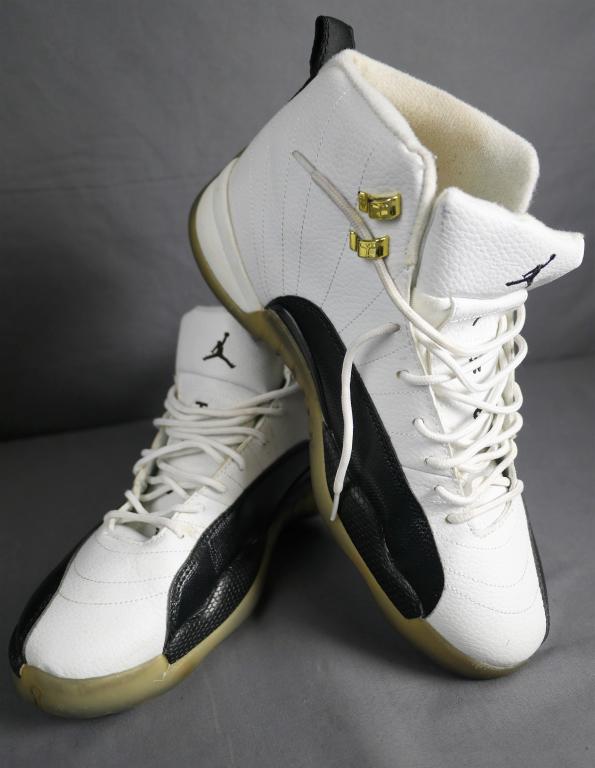Air Jordan Retro 12 Taxi Men's Sneakers: Air Jordan Retro 12 Taxi Men's Sneakers. Size- 12. Condition: Used