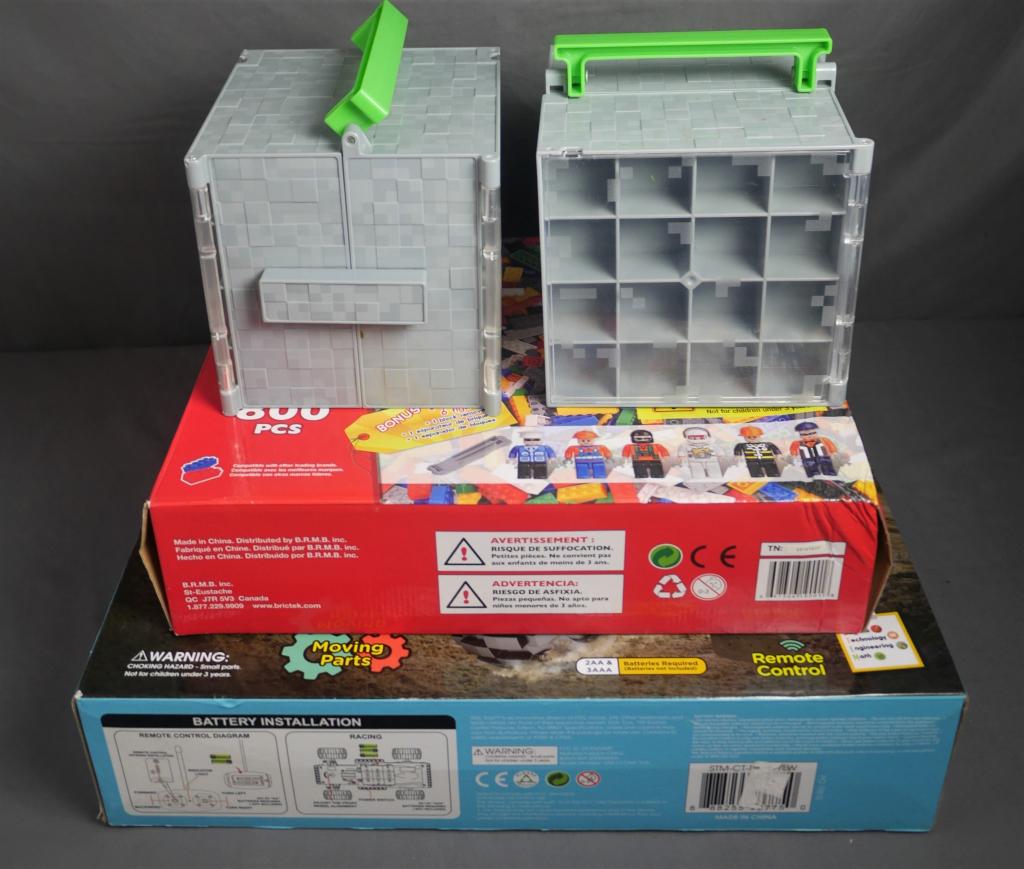 Stem Genius Dump Truck & Bric Tek Building Blocks: Stem Genius Remote Controlled Dump Truck; Bric Tek Super Pack/ Coffret Building Blocks, Two Minecraft Mini Figure Collector Cases. Condition: Appears to be in good condition