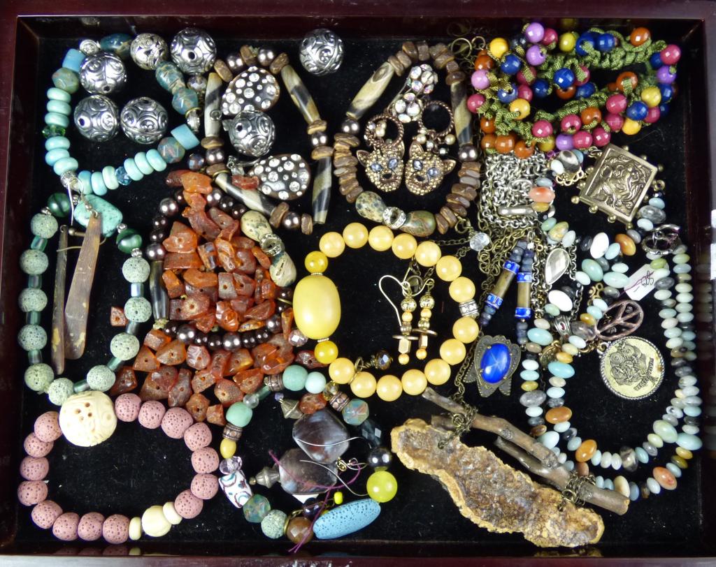 Vintage Cosume Jewerly Lot: Includes bracelets, necklaces, earrings and loose amber beads. All in good overall condition, some might be as found.