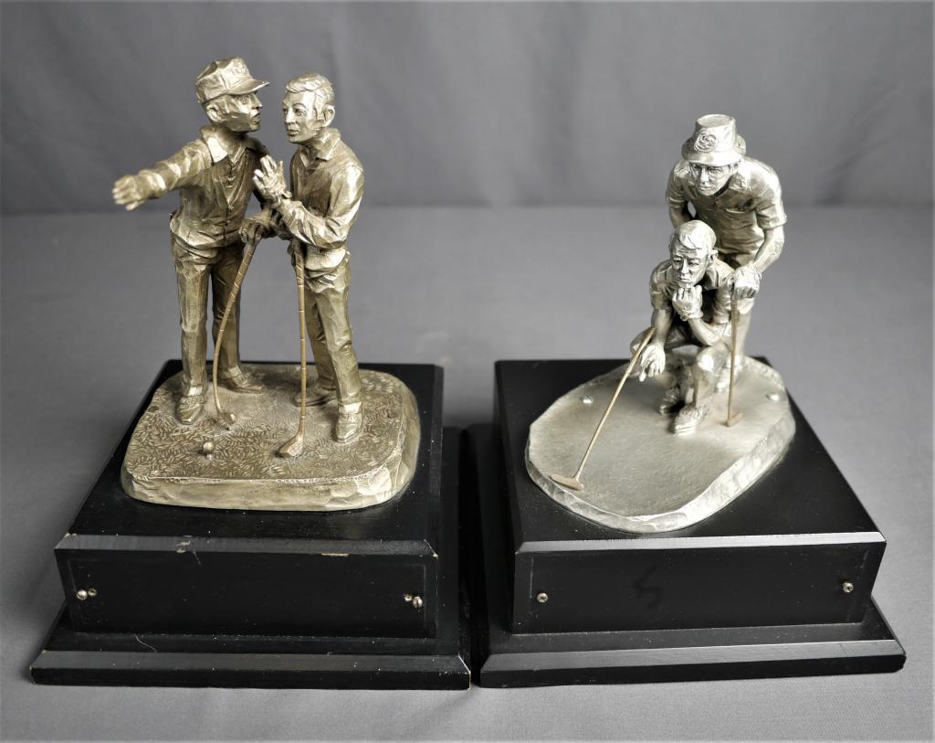 Hudson Pewter 2 Philip Kraczkowski Golf Sculptures: Measuring 8.5" tall, both of these metal sculptures were crafted by Philip Kraczkowski in 1972. Both are signed and in good vintage condition. Remarkable detail by artist in both clothing and faces of