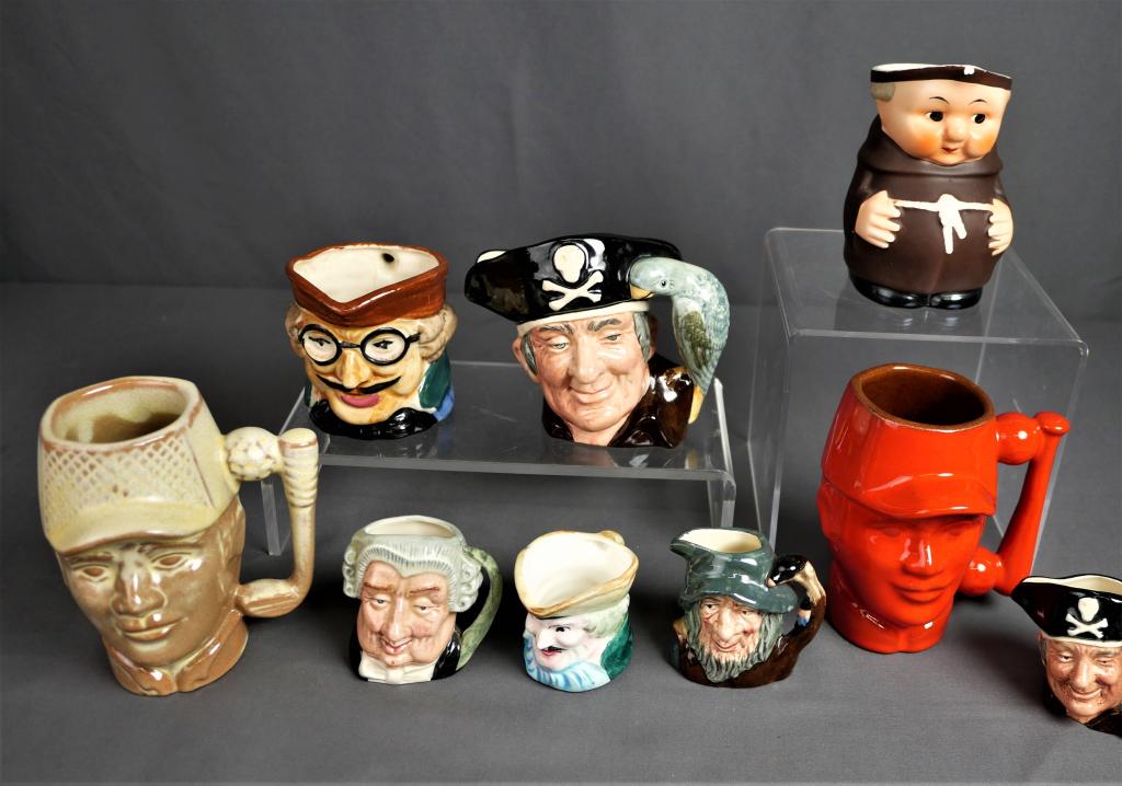 Lot of 9 Vintage Character Jugs / Royal Doulton: A nice variety of character jugs from Royal Daulton and others. Royal Daulton: small "The Lawyer" (D6524), small "Long John Silver" (D6512), medium "Long John Silver" (D6386), and small "Rip Van Winkl