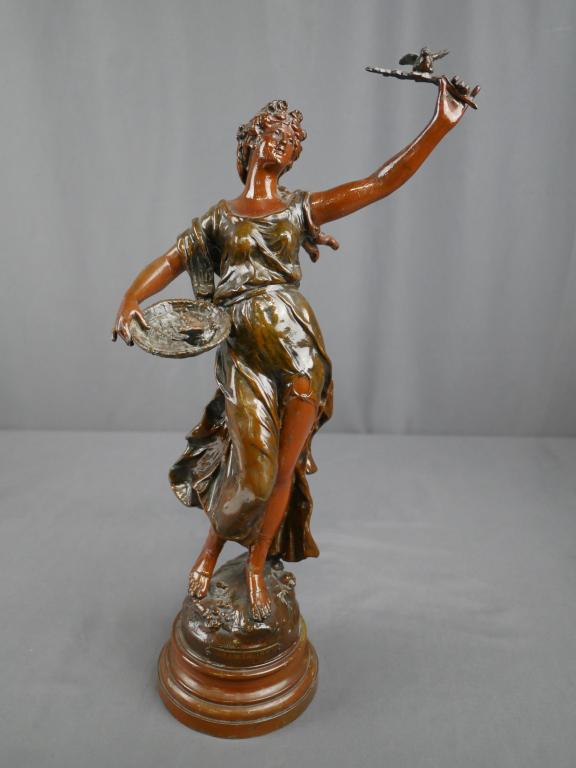Columbella Spelter Metal Sculpture Auguste Moreau: after Auguste Moreau "Columbella" Bronze Finish Spelter Metal Sculpture. Measures 17 1/2" tall. Condition: Good