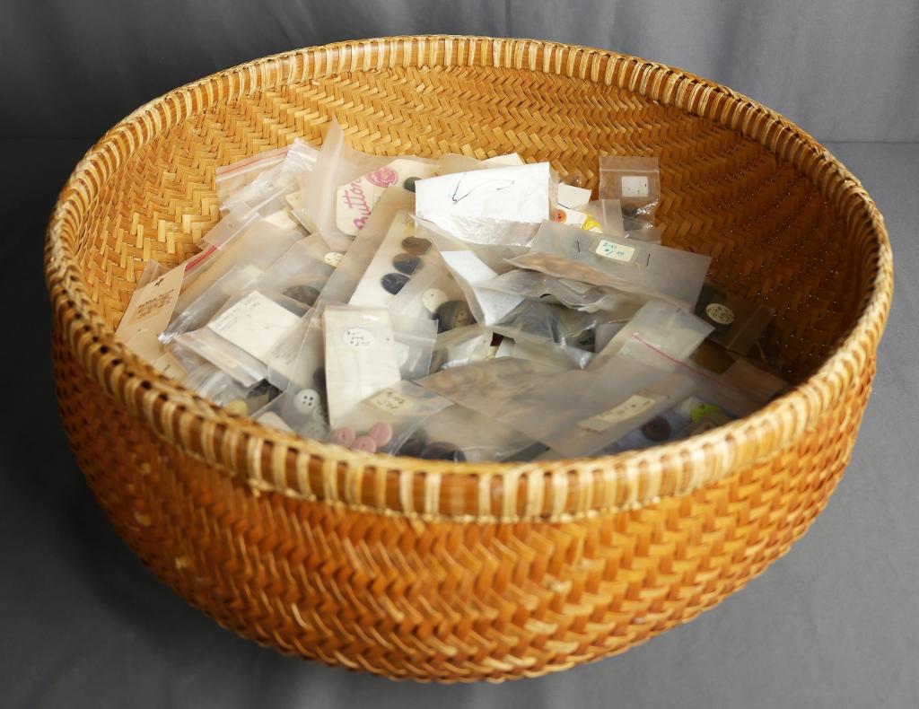 Raymor MCM Basket Full of Retro Buttons: HUGE MCM "Raymor" brand basket (18"dia) full of vintage and retro buttons. Many styles, colors, and sizes - majority of buttons are still in original vintage packaging. Lot came from well-established