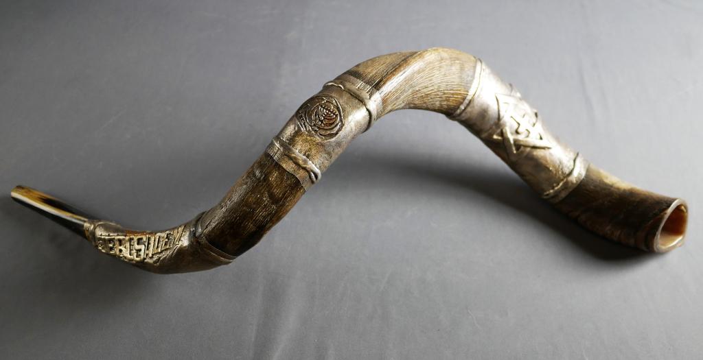 Israel Sterling Silver Plated Yemenite Kudu Shofar: Sterling Silver Plated Yemenite Kudu Shofar- Jerusalem Design. Measures approx. 37" lengthways. Condition: Sterling layer is chipping in some places
