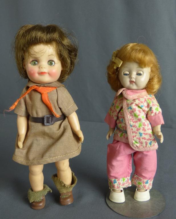 1960's Dolls- Effanbee Brownie Girl Scout Doll: 1960's Dolls- 1965 Effanbee Brownie Girl Scout Doll and Hard Plastic Doll fromthe same times. Measure approx. 8' tall. Condition: Good