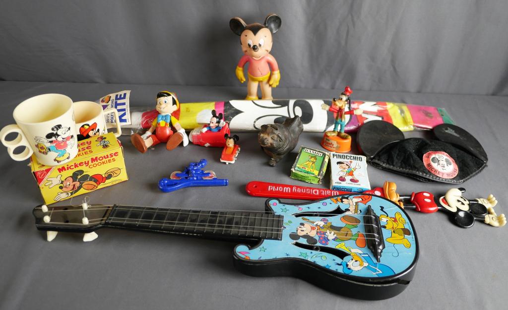 Vintgae Disney Toys & Collectibles- Mickey, Goofy: Lot of Vintage Disney Toys and Collectibles including Mickey Guitar. Vintage Dinsey World Mickey Hat; Kite, Mugs, Toys. Condition: Good
