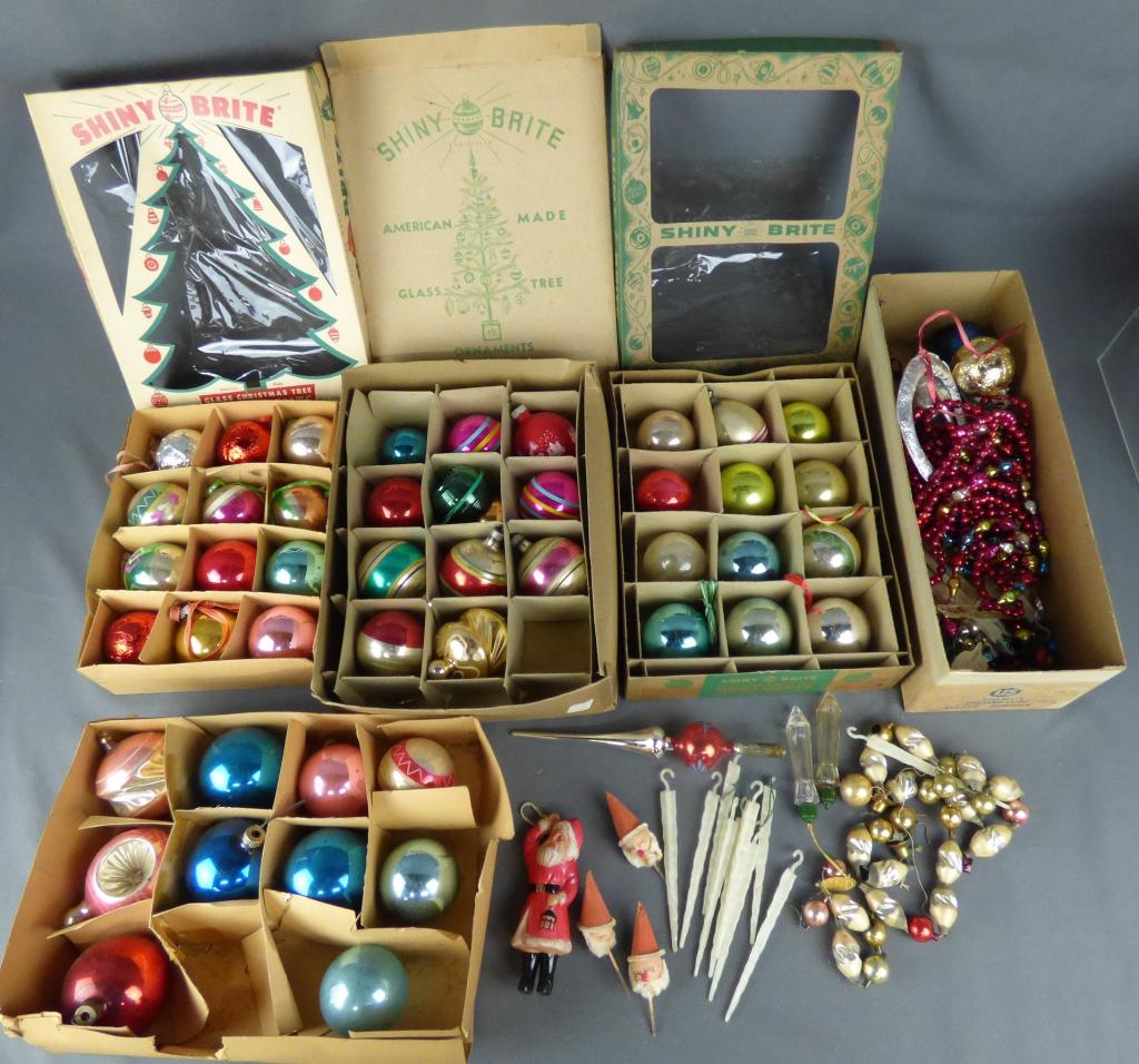 Vintage 1960's Christmas Ornaments & Deocrations: Four boxes of classic vintage Christmas ornaments in various colors, shapes, and sizes by Shiny Bright. Lot also includes one box of miscellaneous Christmas ornament dÃ©cor including German made tre