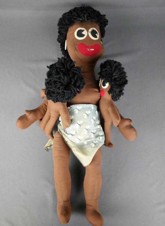 Black Americana Soft Cloth/ Plush Doll: Black Americana Soft Cloth/ Plush Mother with two nursing children that 'button on.' Measures approx 24" by 10" wide. Mother is wearing a beautiful blue skirt with butterflies. In very good condition,