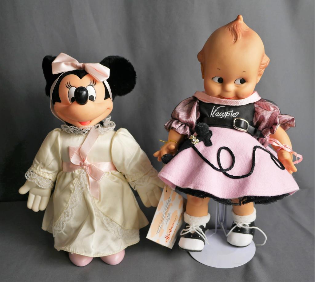 Vintage Effanbee Kewpie Doll & Minnie Mouse: Vintage 1987 Jessco Effanbee Kewpie Doll in pink dress on display stand and Applause brand Minnie Mouse doll from the 80's in wedding dress. Both items are in good condition.