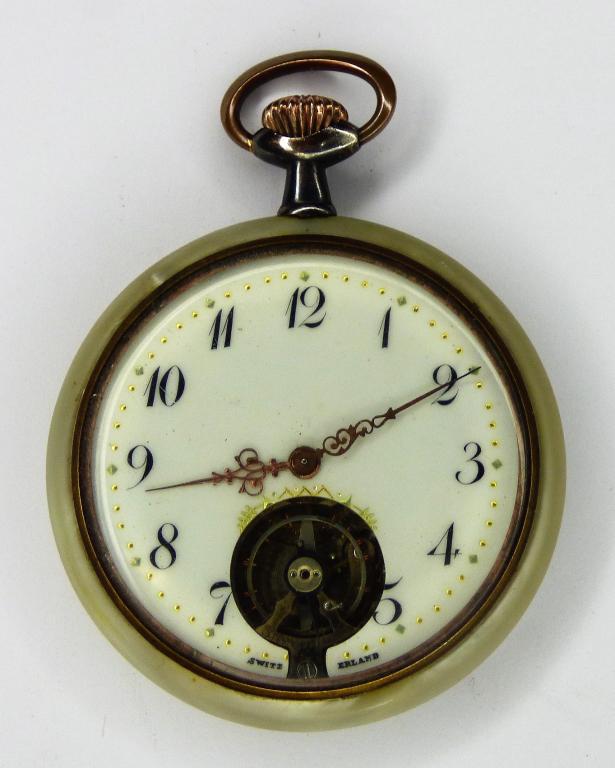 Antique Switzerland Mother of Pearl Pocket Watch: Mother of pearl backed pocket watch marked "Switzerland" on face. Really beautiful ornate hands and see thru mechanics on face. Untested, in as found condition but body of watch is in overall good sha