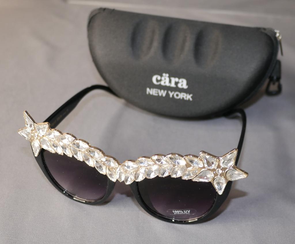 Elegant Starlet Sunglasses: Brand new sunglasses decorated with beautiful gems, bookended by stars. They are so classy and pretty! In great condition. Come with case