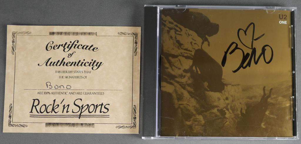 Bono U2 One Signed CD Cover w/ COA: Bono U2 One Signed CD Cover. Comes with COA. Condition: Good