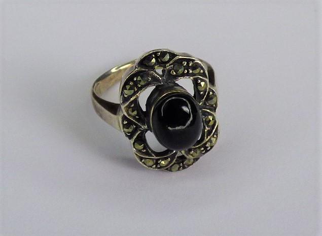 Sterling Silver Marcasite Ring with Onyx Stone: Sterling Silver Marcasite Ring with Black Onyx Stone. Size- 4 1/2. Condition: Good