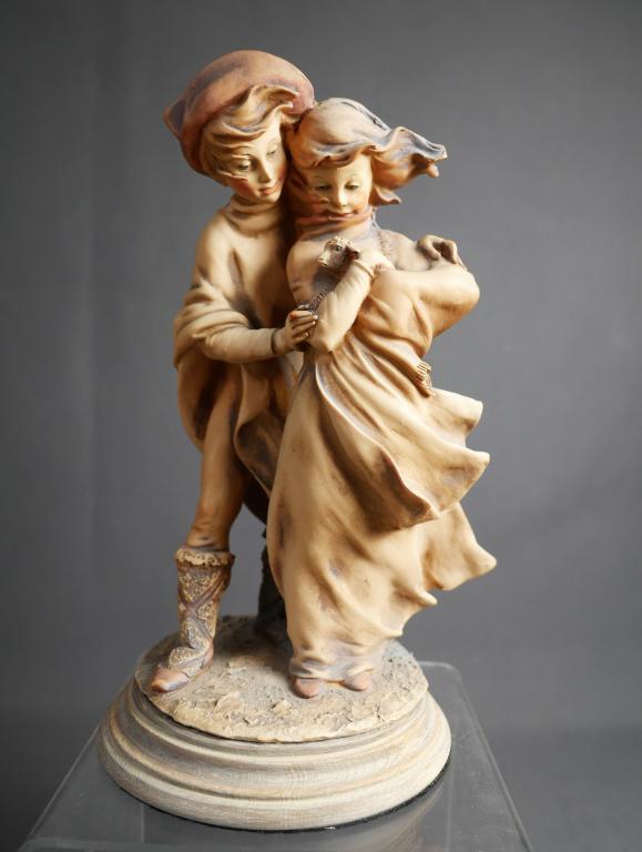Giuseppe Armani Boy & Girl with Lamb Figurine: Giuseppe Armani Boy & Girl with Lamb Figurine. Measures approx. 9 1/2" tall. Good condition.