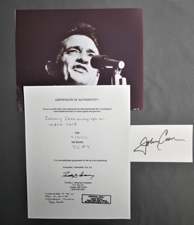 Johny Cash Autograph/ Signature with COA: Johny Cash Autograph on Index Card with Vintage 8" x 10" Photograph. Comes with Certificate of Authenticity. Condition: Good. We truly believe that this item is authentic, but Esquis Auctions does not