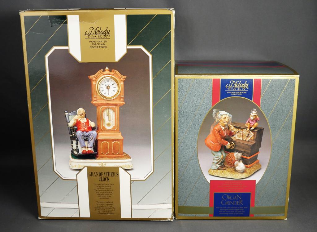 Waco Melody in Motion Music Figurines- Grandfather: Two Waco Melody in Motion Music Figurines- "Grandfather's Clock" and "Organ Grinder". Approx. 10" tall. Both appear to be in mint/ near mint condition with original boxes.