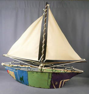Large Metal Crafted Sailing Ship Model: Large Sheet Metal Carfted Sailing Ship Model. 35" x 32" x 9". Shipping is available for this lot, but be aware of higher shipping charges because of size.