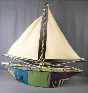 Large Metal Crafted Sailing Ship Model: Large Sheet Metal Carfted Sailing Ship Model. 35" x 32" x 9". Shipping is available for this lot, but be aware of higher shipping charges because of size.