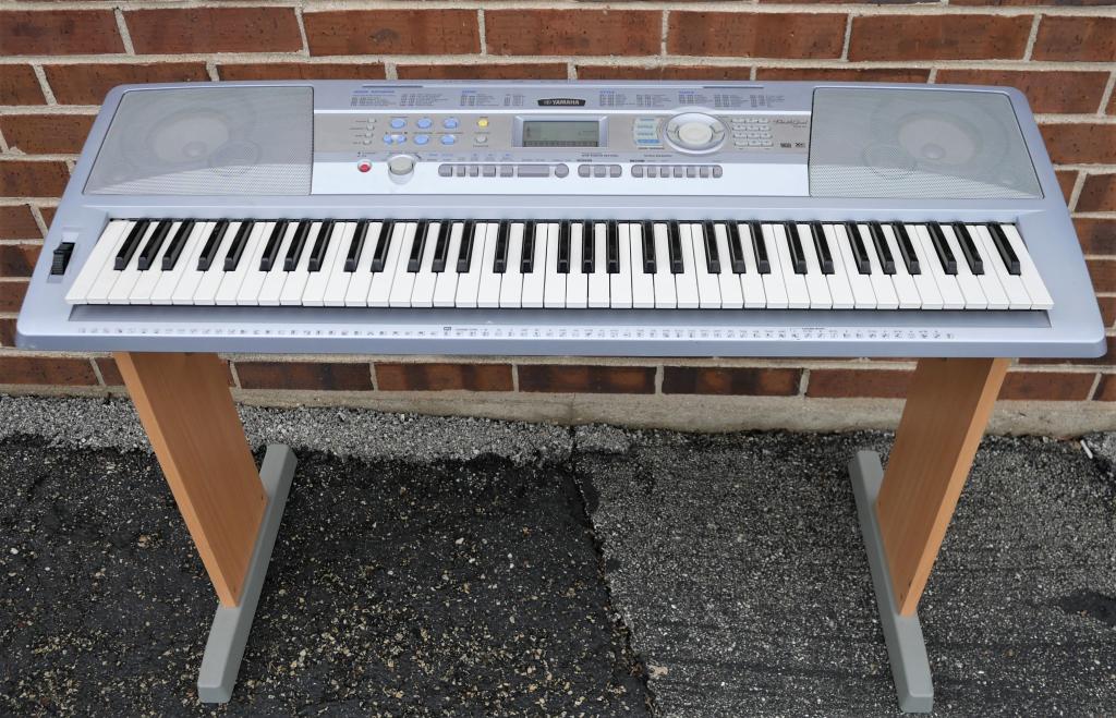 Yamaha DGX-220 Portable Grand Electronic Keyboard: Yamaha DGX-220 Portable Grand Electronic Keyboard with stand. Good overall condition. No cord, tested with another cord- turns on, was not fully tested.