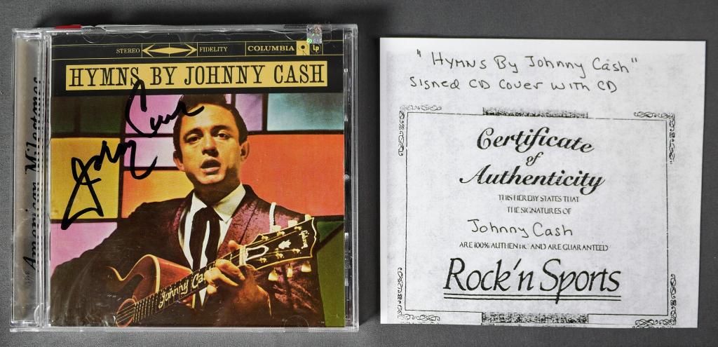 Hymns by Johny Cash Autographed Cd Cover: Hymns by Johny Cash Autographed Cd Cover with CD. Comes with Certificate of Authenticity. Condition: Good. We truly believe that this item is authentic, but Esquis Auctions does not have specialists o