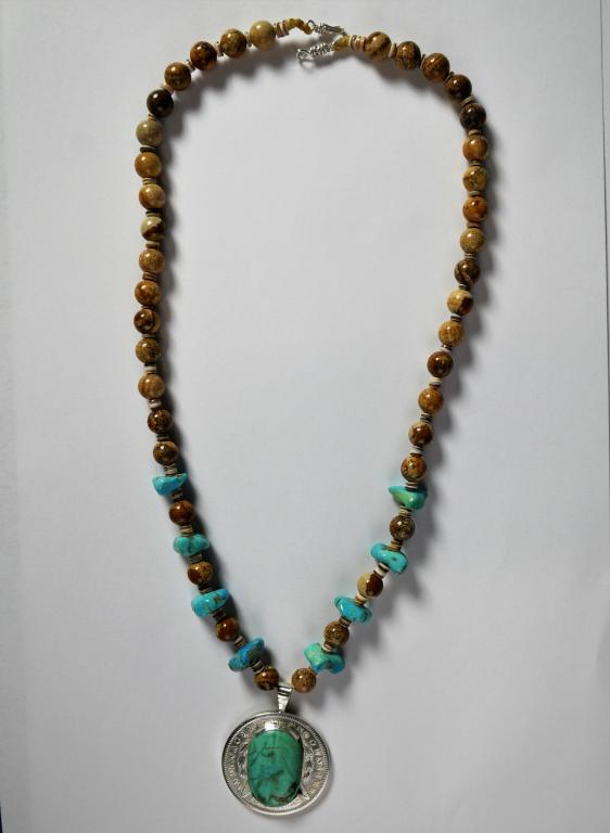 Jasper Beads, Turquoise & Silver Dollar Necklace: Necklace made of Large Desert Jasper Beads, Native American Shell Heishi Beads, Bisbee Mine Turquoise with US Silver Morgan Dollar. By artist Iron Wolf Thompson, a nationally known Black Native Americ