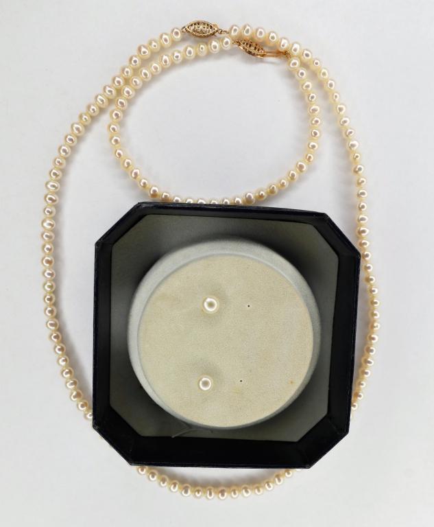 10k Gold Pearls Necklace. Bracelet & Earrings: Genuine Pearls Necklace, Bracelet and Earrings with 10k Gold clasps and studs. Necklace is 18" long, bracelet is 7 1/2". Good Condition.