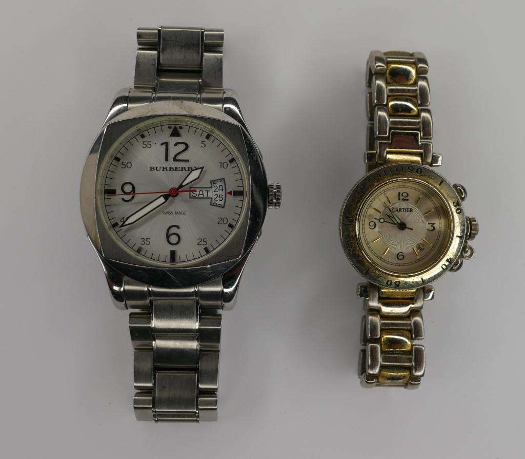 Burberry Swiss Made Mens Wrist Watch & Cartier Lad: Barberry Swiss Made Mens Wrist Watch & Cartier Ladies Replica Wrist Watch. Both are untested