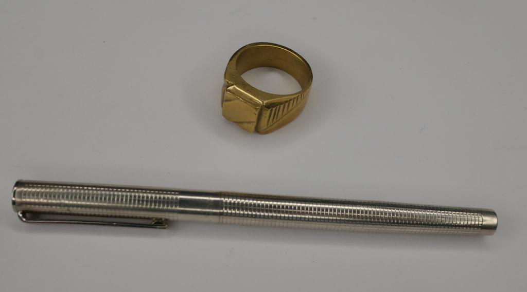 Tiffany & Co Sterling Silver Pen & 18k Mrkd Ring: Tiffany & Co Sterling Silver Pen (Shell only, no refill) and 18k marked mens ring- size 11 1/4". GoodCondition.