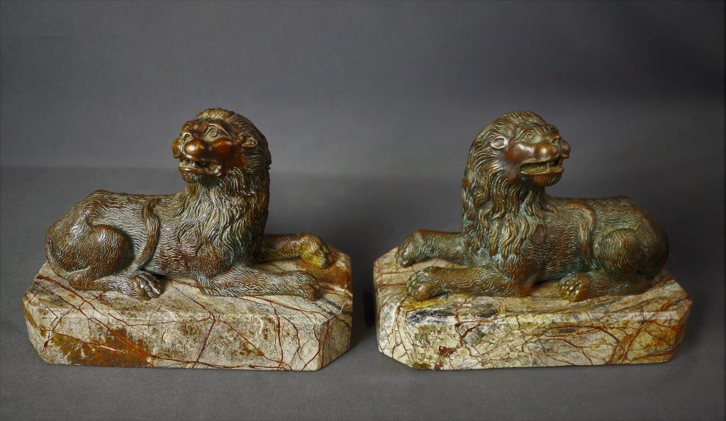Theodore Alexander Pair of Bronze/ Brass Lions: Theodore Alexander Pair of Bronze/ Brass Lions Sculptures/ Bookends. Measure 8" x 4" x 6 1/2". Good Condition.