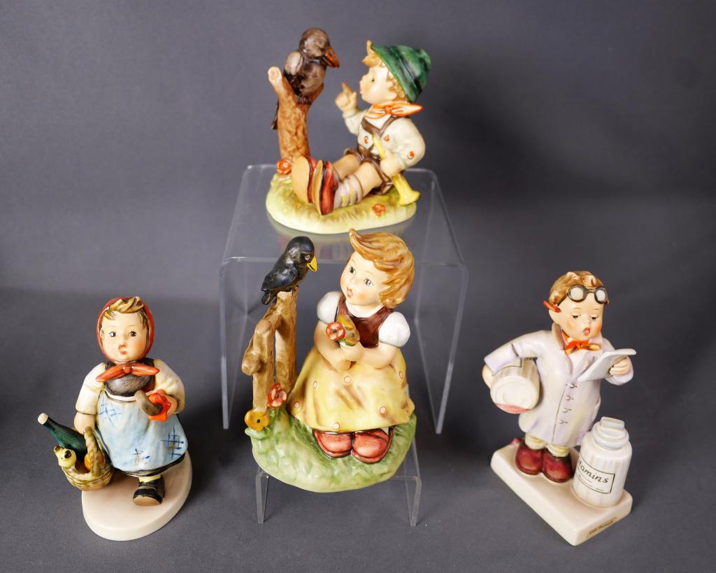 Hummel Goebel Porcelain Figurines- Lot of 4: Group of 4 Hummel Goebel Porcelain Figurines- Sing Along 433, Sing Along 405, Little Pharmacist 322 and Visiting an Invalit 382. 5"- 3 1/2" tall. All are in good condition