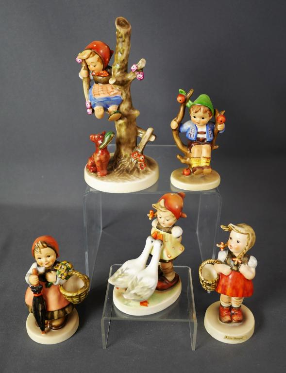 Hummel Goebel Porcelain Figurines- Lot of 5: Lot of 5 Hummel Goebel Figurines- Out of Danger 56/B, Apple Tree Boy 142/0, On Holiday 350, Goose Girl 47 3/0 and Little Shopper 96. All are in good condition.