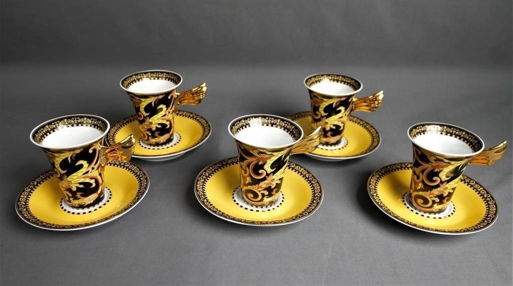 Versace Barocco Teacup & Saucer Set of 5: Set of 5 Versace Barocco teacups with matching saucers. Teacups stand 3.5" tall with iconic Versace design and stunning gold wing handles. Diameter of matching saucers is 5.7". Good Condition