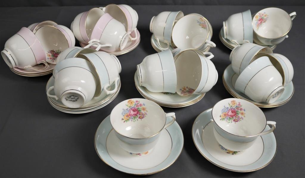 Vale Genuine English Bone China Cups & Saucers: 23 Cups and Saucers by Vale, Longton, England. Cups are 2 1/2" tall, Saucers are 5 3/4" in diameter. Condition: Good