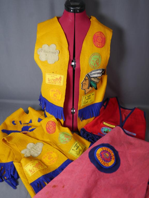 1960's Indian Guides YMCA Canoe on Wheels Vests: 1960's Indian Guides Canoe on Wheels Vests with unique historical patches. Lot of 5. All show age related wear.