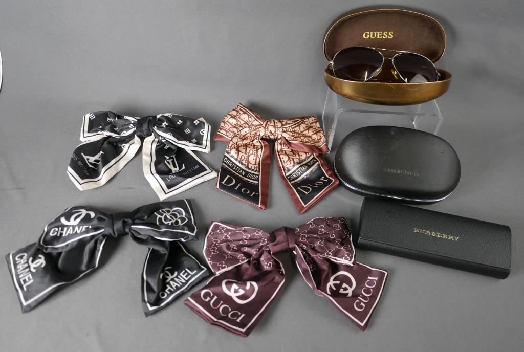 Dior, Gucci, Vouiton, Chanel Bow Ribbon Hair Clips: Dior, Gucci, Vouiton, Chanel Bow Ribbon Hair Clips, Guess Eayglasses in Case, Burberry and Armani Eyglasses Cases. Alla re in good condition.