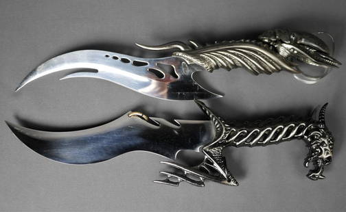 Two Fantasy Daggers/ Knives w/ Dragon & Alien Hand: Two Fantasy Daggers/ Knives w/ Dragon & Alien Handles. 14 1/2"- 15" long. Good Condition.