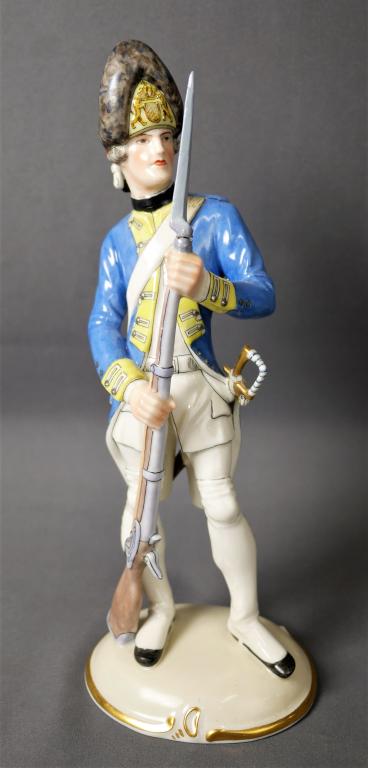 Antique Nymphenburg Porcelain Grenadier Figurine: Antique Antique Nymphenburg Porcelain Figurine - "Bayrischer Grendier 4 Regiment, 1788". Made in Germany. 10 1/2" tall. Good overall condition- crack at the place where bayonet attaches to rifle.