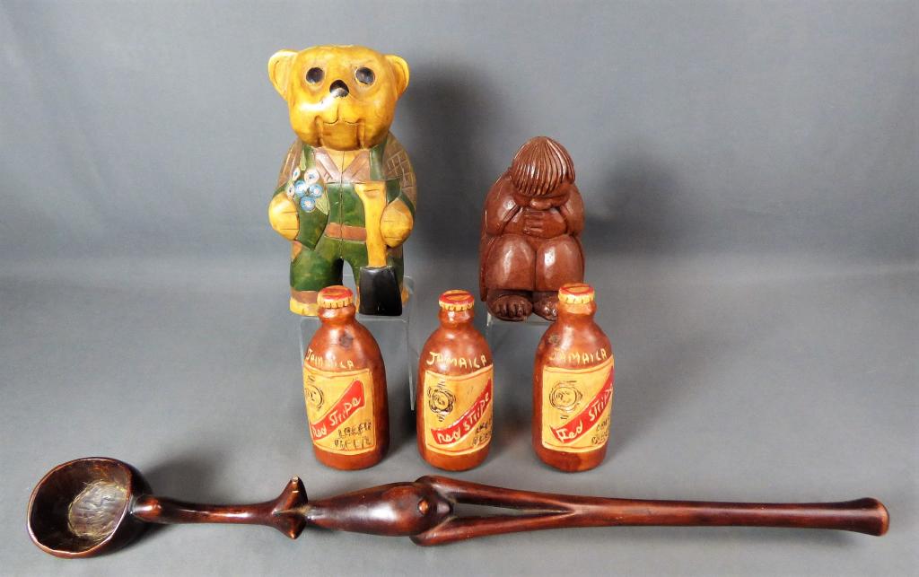 Wood Carved Sculptures including African Nude Girl: Wood Carved Sculptures including African Nude Girl Spoon, Teddy Bear, Sitting Old Man signed J. Pinal and Beer Bottles. Spoon is 24" long, 10"-7" tall. Good Condition.