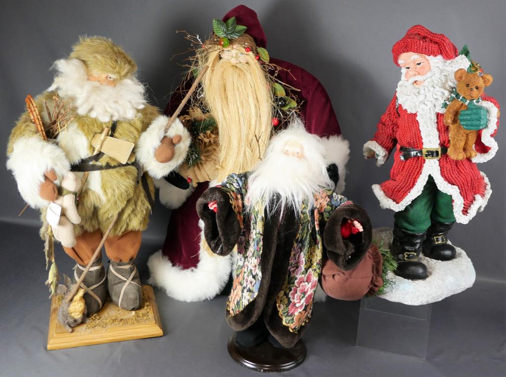 Christmas Holiday Decor- 4 Santa Claus Statues: Christmas Holiday Decor- 4 Santa Claus Statues. Measure 17"-24" tall.