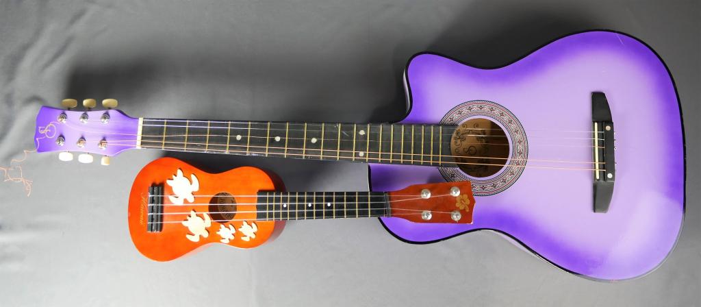 Vintage Acoustic Guitar and Ukulele Guitar: Vintage Acoustic Guitar and Ukulele Guitar. Both are in goodoverall condition, some minor wear, acoustic guitar needs new string.